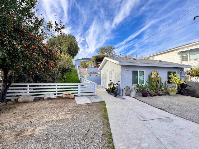 view of front of property with a patio