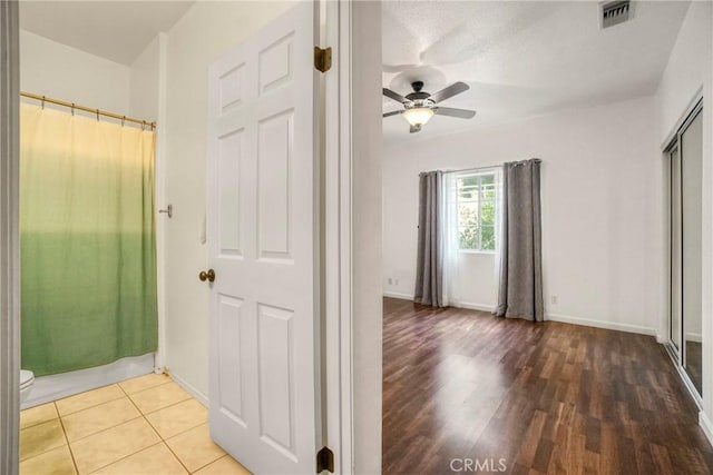 corridor featuring hardwood / wood-style flooring