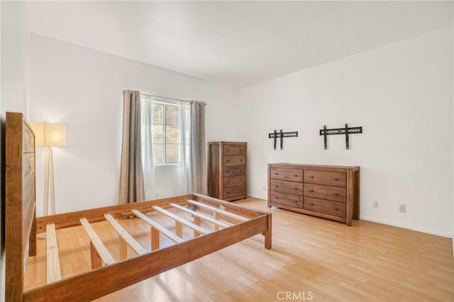 bedroom featuring hardwood / wood-style floors