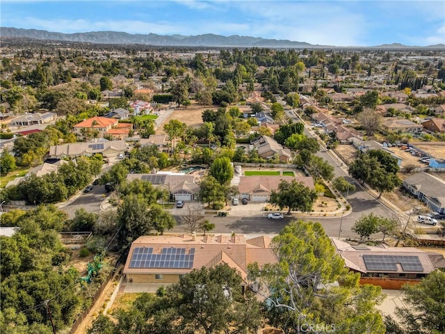 drone / aerial view featuring a mountain view