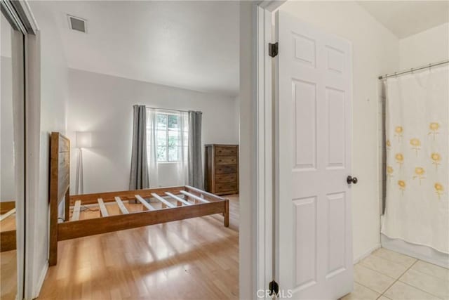 interior space with light tile patterned floors