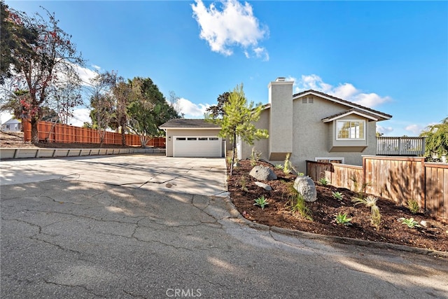 view of front of property with a garage