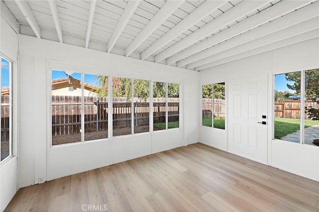 unfurnished sunroom with wooden ceiling and beam ceiling