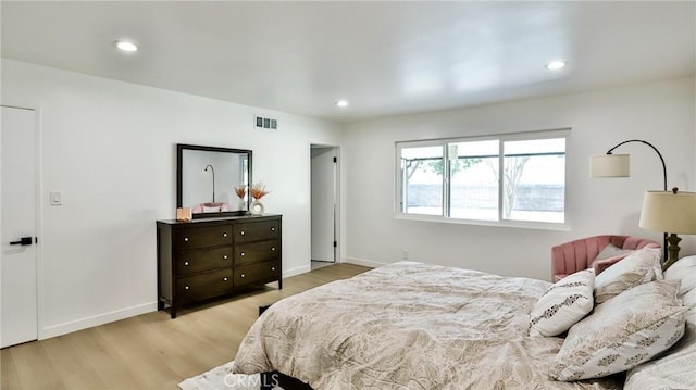 bedroom featuring light hardwood / wood-style flooring