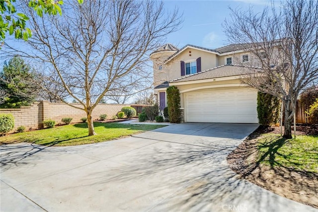 view of front of property featuring an attached garage, fence, concrete driveway, and stucco siding