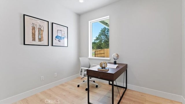 home office featuring light wood-type flooring