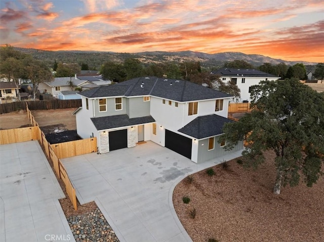 aerial view at dusk with a mountain view