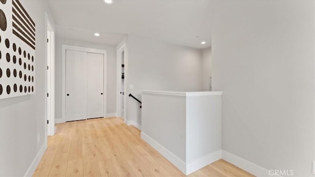 corridor featuring light wood-type flooring