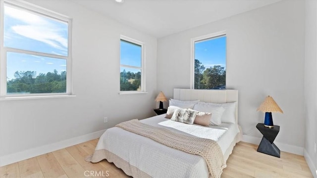 bedroom featuring light hardwood / wood-style flooring