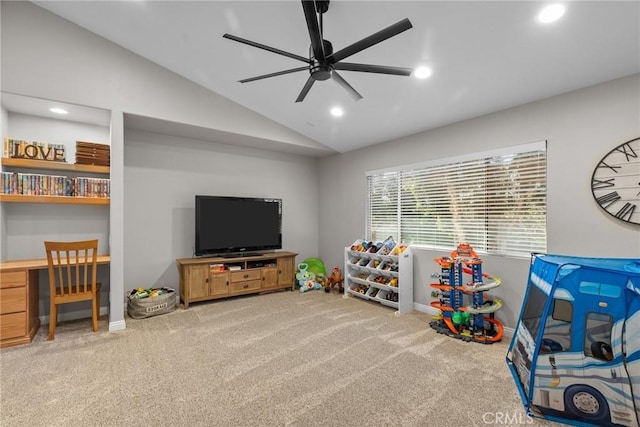 playroom with vaulted ceiling, carpet, and ceiling fan