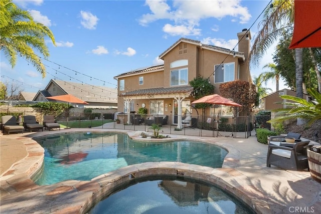 view of pool featuring a patio area