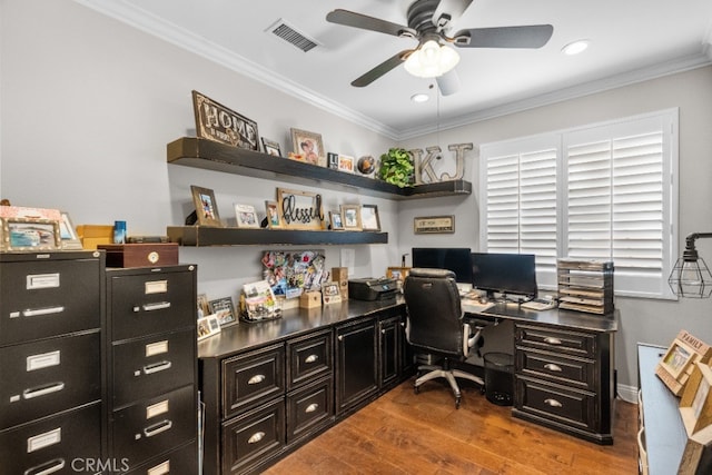 home office featuring ornamental molding, wood-type flooring, and ceiling fan