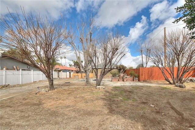 view of yard featuring fence