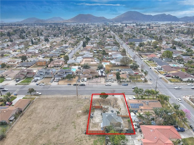 bird's eye view with a residential view and a mountain view