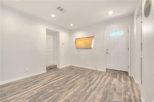 entryway with recessed lighting, baseboards, visible vents, and wood finished floors
