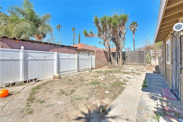 view of yard featuring a fenced backyard