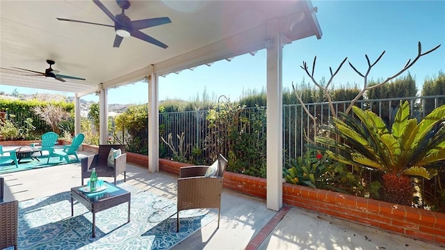 view of patio / terrace featuring ceiling fan