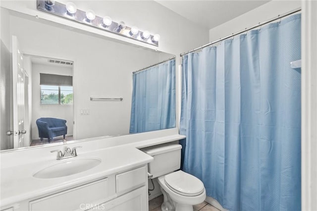 full bath with visible vents, toilet, a shower with curtain, tile patterned floors, and vanity