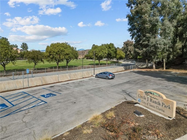 uncovered parking lot with fence