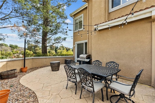 view of patio / terrace featuring outdoor dining space and area for grilling