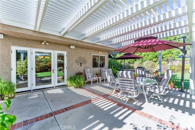 view of patio / terrace featuring french doors, fence, and a pergola