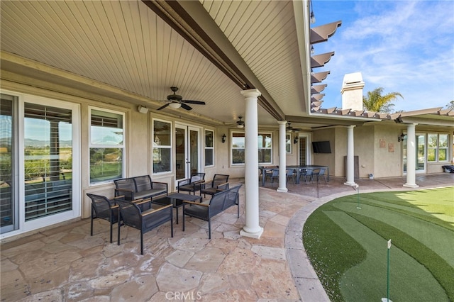 view of patio with ceiling fan