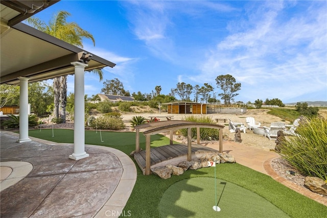 surrounding community with a patio area