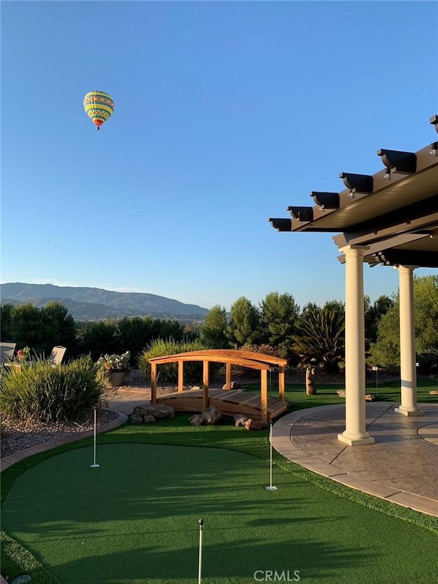 view of home's community featuring a mountain view