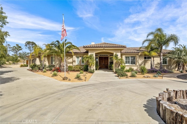 view of mediterranean / spanish-style house