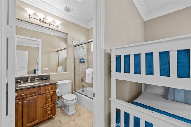 full bathroom featuring toilet, vanity, combined bath / shower with glass door, and ornamental molding