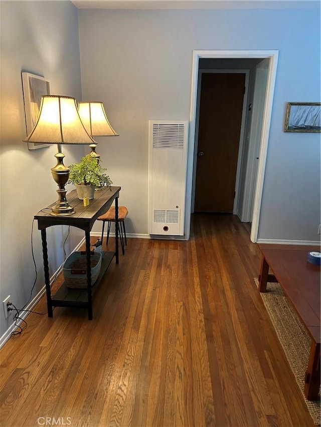 corridor with dark wood-type flooring