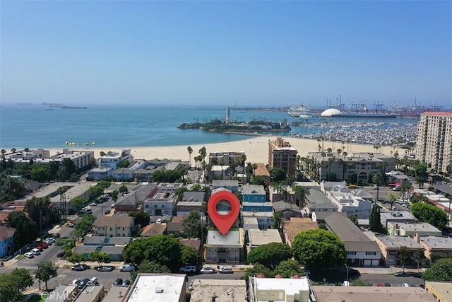 aerial view featuring a water view and a view of the beach