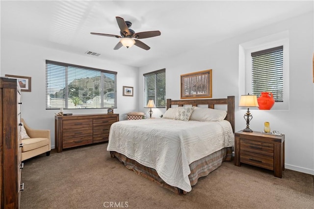 carpeted bedroom featuring ceiling fan