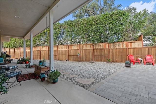 view of patio featuring a fenced backyard