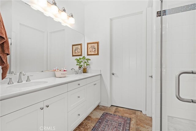 bathroom with vanity and walk in shower