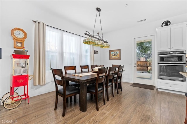 dining room featuring hardwood / wood-style flooring