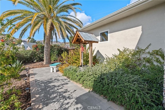 view of yard with a patio area
