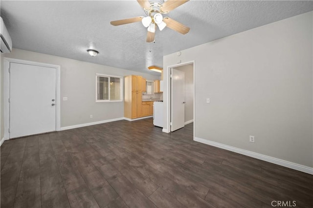 unfurnished living room featuring ceiling fan, dark hardwood / wood-style floors, and a textured ceiling