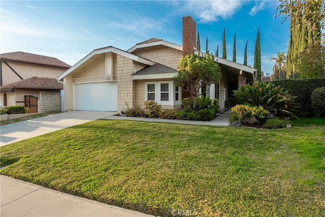 view of front facade featuring a garage and a front lawn