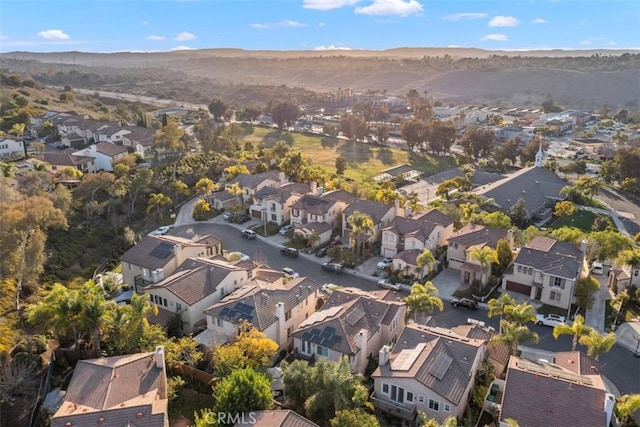 drone / aerial view featuring a mountain view