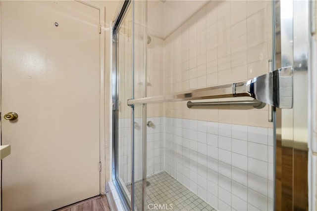 bathroom featuring an enclosed shower