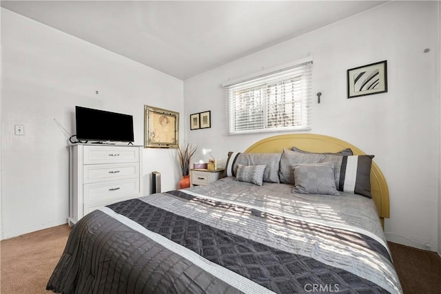 bedroom with light colored carpet