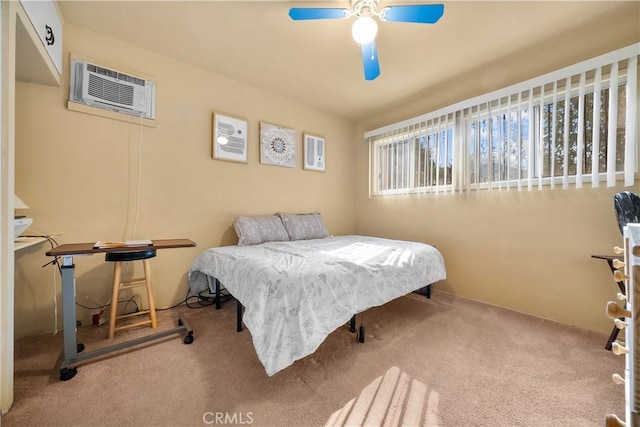 bedroom featuring ceiling fan, light colored carpet, and a wall unit AC