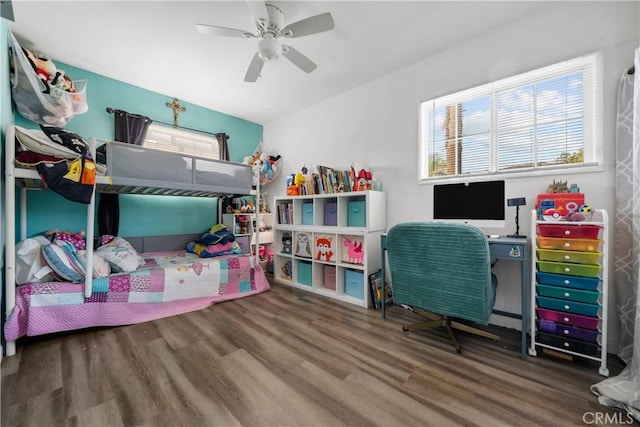 bedroom featuring ceiling fan and wood-type flooring