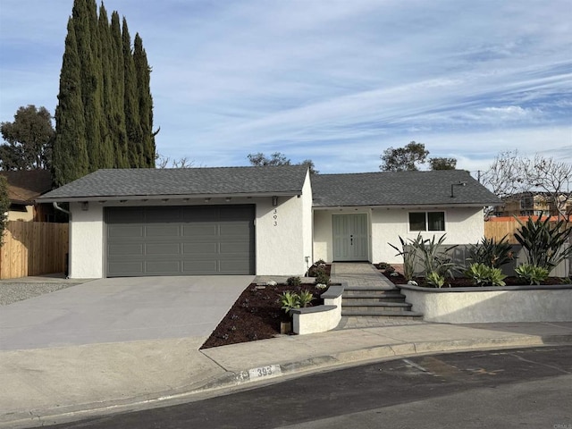 ranch-style home featuring a garage