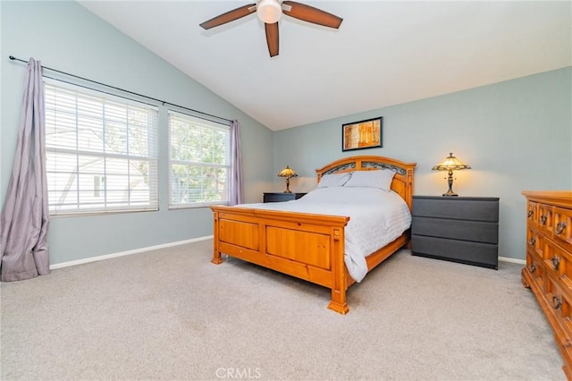 carpeted bedroom featuring ceiling fan and lofted ceiling