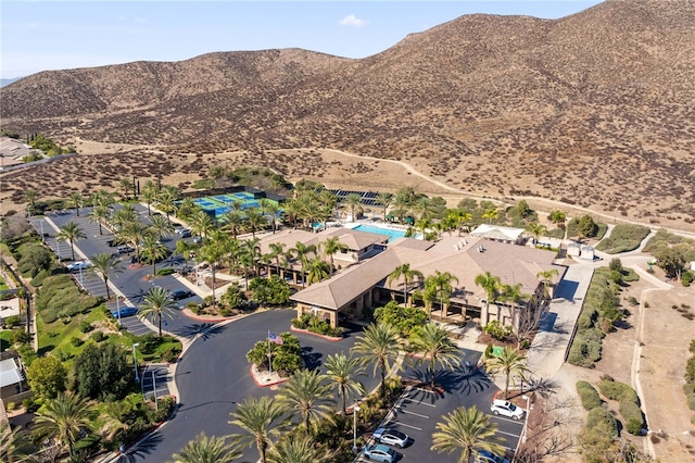 birds eye view of property featuring a mountain view