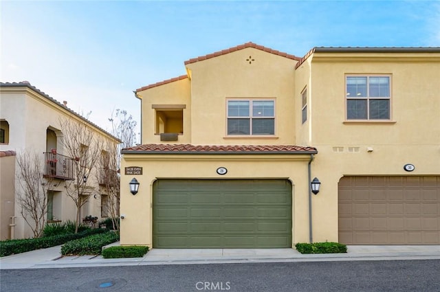 mediterranean / spanish-style house featuring a garage