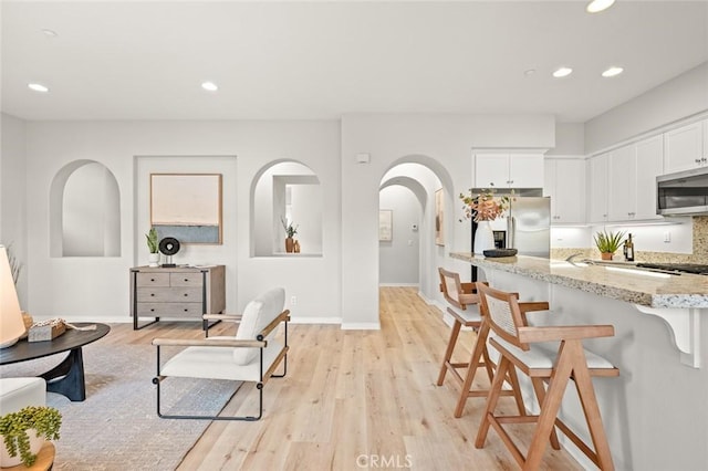 living room with light wood-type flooring