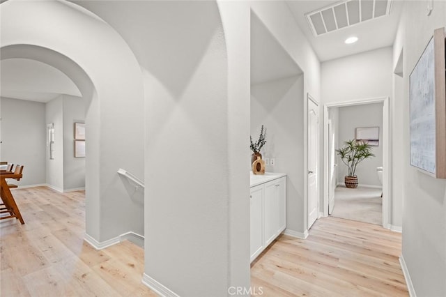 hallway featuring light hardwood / wood-style flooring